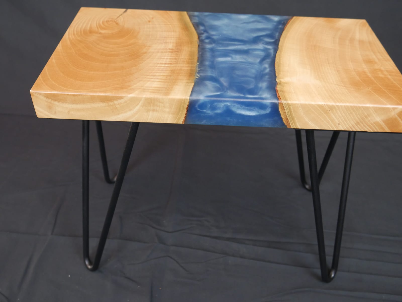 Claret Ash occasional table with silver blue resin